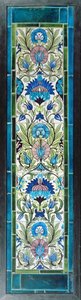 Cinq carreaux avec motif floral continu